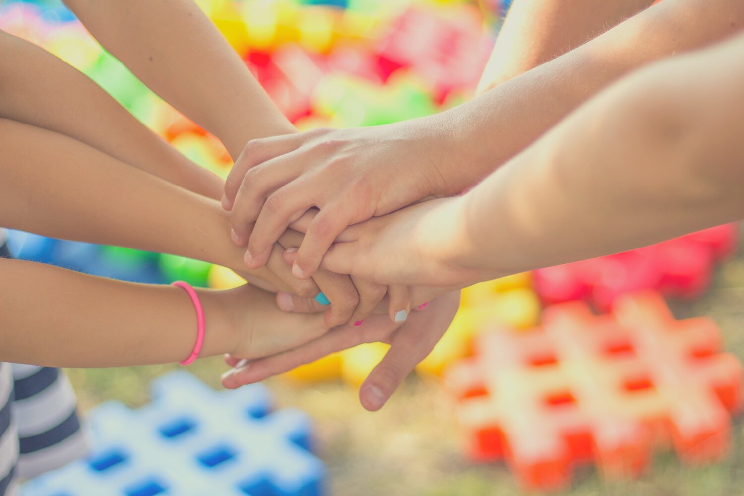 Team Putting Hands Together